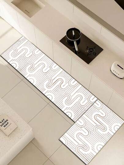 1 pièce Tapis de cuisine moderne minimaliste en motif de vagues géométriques en gel de silice, avec des lignes beiges claires dessinant des courbes en S continues sur un fond blanc avec de fines rayures verticales, offrant un effet visuel lisse, rythmique et élégant. Tapis de cuisine de luxe et à la mode, résistant à la fatigue, avec un matériau de surface en tissu, un matériau absorbant en mousse au milieu et un matériau en caoutchouc au bas, facile à nettoyer, tapis de cuisine absorbant l'eau, d'environ 3,5 mm d'épaisseur
