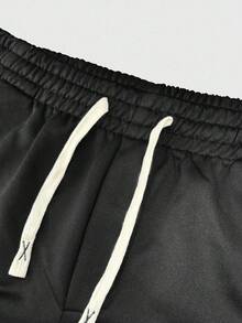 Quần thể thao nam dáng rộng thoải mái in hình trái tim Tom và Jerry, có dây rút ở eo và túi. - màu đen - Xem 3