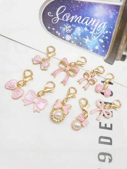 9 mặt dây chuyền hình nơ màu hồng dễ thương, mặt dây chuyền nơ thời trang có móc cài hình càng cua, mặt dây chuyền nơ tráng men dùng để làm trang sức, thích hợp để tự làm mặt dây chuyền vòng tay, phụ kiện túi xách, trang trí giày dép, phụ kiện quần áo, bông tai, dây chuyền, dây đeo điện thoại, trang trí tiệc tùng, tuyệt vời cho các hoạt động thủ công mỹ nghệ (Giao hàng ngẫu nhiên nhiều loại)