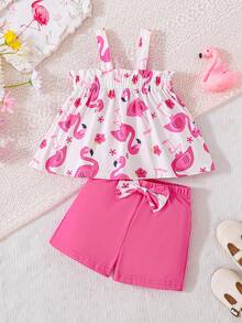 Bộ 2 món cho bé gái gồm áo hai dây in hình phượng hoàng hoạt hình và quần short có nơ, thích hợp cho mùa xuân/hè. - Màu Hồng Tươi - Xem 1