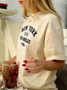 New York Los Angeles Independence Day Graphic Tee Independence Day Shirt Y2k Woman Teen Girls Tee,Vintage Print Top, Funny Cute Graphic Letter Tee Crew Neck Cool Summer Shirt Short Sleeve Top,Animal Fruite Pet Pattern, Women Graphic-Shirt, Fashion 2025,Gifts, Women's Clothing, Cartoon And Letter Printing, Comfortable Cotton Material, Skin Friendly, Soft And Cool, Spring Summer Women's-Shirt ClothingSports Short Sleeves - 杏色 - 查看 1