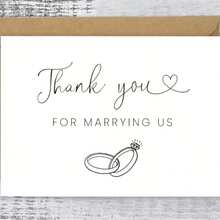 A Wedding Card Featuring A Design Of White Matching Rings. - White Wedding Rings - View 3