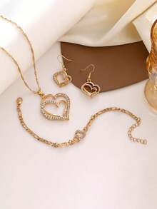 Bộ 4 món gồm bông tai hình trái tim đôi, dây chuyền và vòng tay, trang sức cưới dành cho nữ. - Vàng - Xem 3