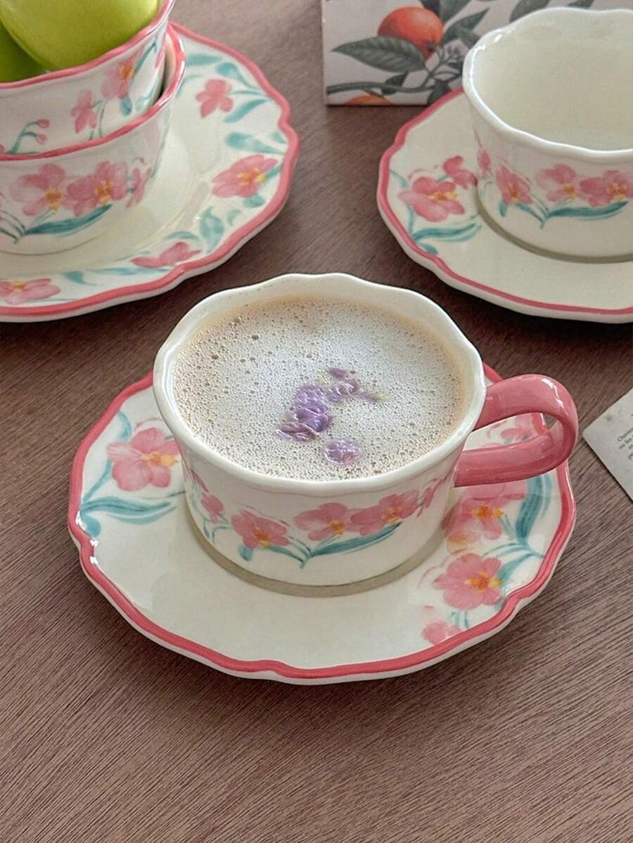 一套INS风粉雾兰花陶瓷咖啡杯碟套装，釉下彩工艺，手绘花卉图案，少女设计，INS风时尚浪漫，手绘粉雾兰花，视觉及使用体验