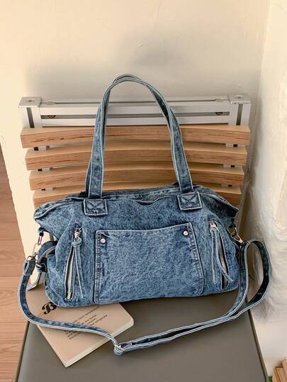 新款复古风休闲水洗牛仔单肩手提包，多口袋设计，多功能通勤包，容量充足，非常适合购物和日常通勤。