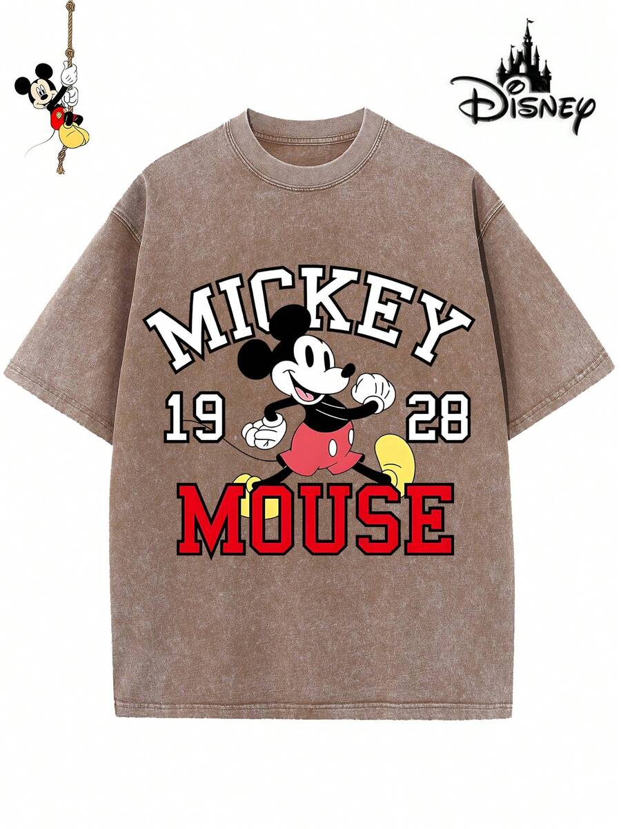 T-shirt homme en coton sous licence Disney, idéal pour les fêtes de fin d'année 2026. Orné d'un motif Mickey Mouse, doté d'un col rond décontracté et confectionné dans une matière douce, confortable et facile d'entretien, ce t-shirt convient à toutes les occasions – voyages, quotidien ou trajets domicile-travail – et vous plongera dans une ambiance festive. - Marron - Voir 1