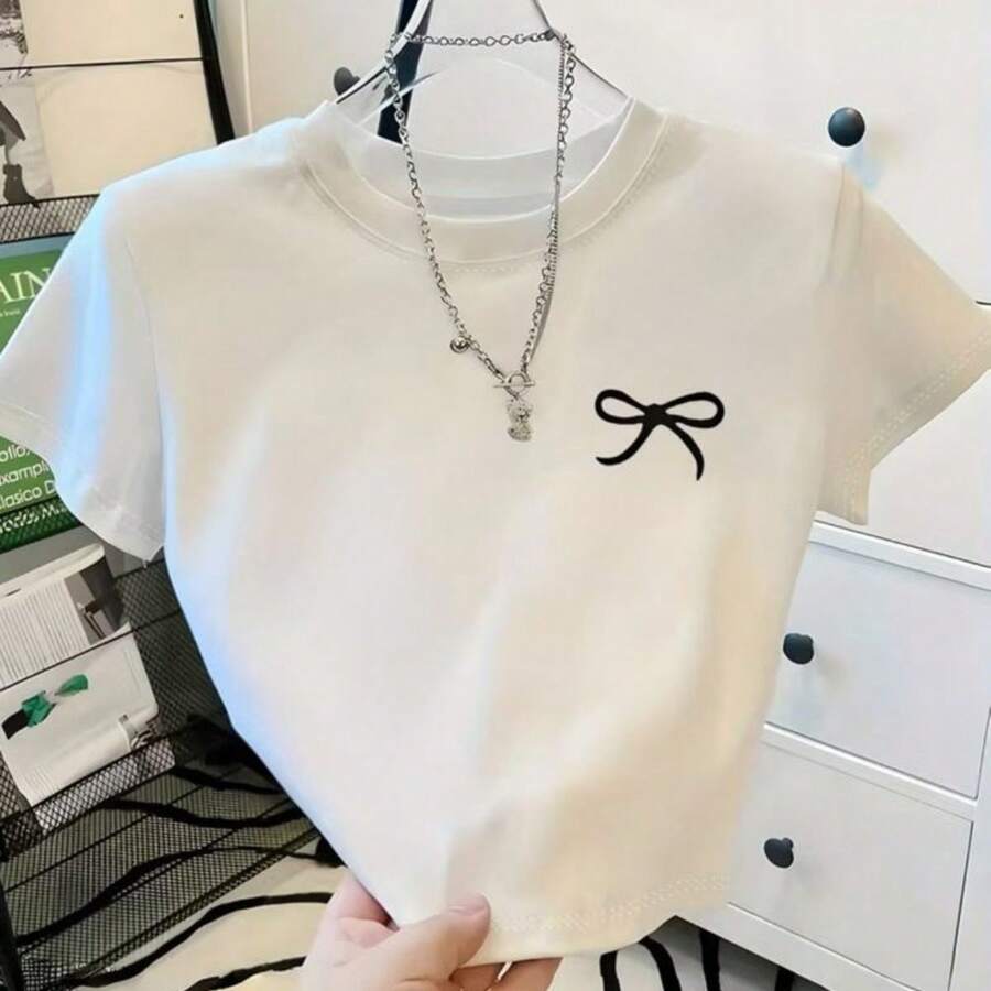 Women's Cropped T-Shirt With Bow Print. Short-Sleeved Cropped Top In Lightweight And Comfortable Fabric. Perfect For Everyday Wear. - trắng - Xem 1