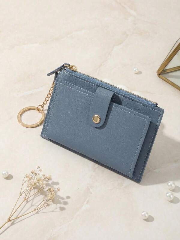 1个简约纯色搭扣多功能收纳袋，可用于存放身份证件和现金票据