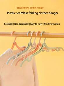 10 piezas de perchas de ropa plegables para viaje, de plástico portátil y duradero con acabado pulido, diseño antideslizante, perchas minimalistas para ahorrar espacio. - Multicolor - Ver 1