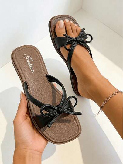 女士黑色蝴蝶结拖鞋，新款蝴蝶结露趾舒适平底人字拖，休闲时尚蝴蝶结装饰人字拖凉鞋，户外沙滩夏季鞋