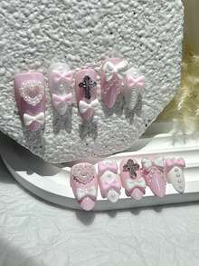 10片Y2K坏女孩蝴蝶结珍珠可爱粉白手工按压式美甲贴片，心形十字架卡哇伊美甲用品（1片果冻贴纸+1个指甲锉） - 粉色 - 查看 2