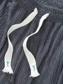 1 chiếc quần thể thao nam dáng suông mùa xuân/hè, có dây rút và túi bên hông, kiểu dáng tối giản, màu trơn, nhẹ, phù hợp cho các hoạt động ngoài trời, chạy bộ, đạp xe. - Màu xám đen - Xem 4