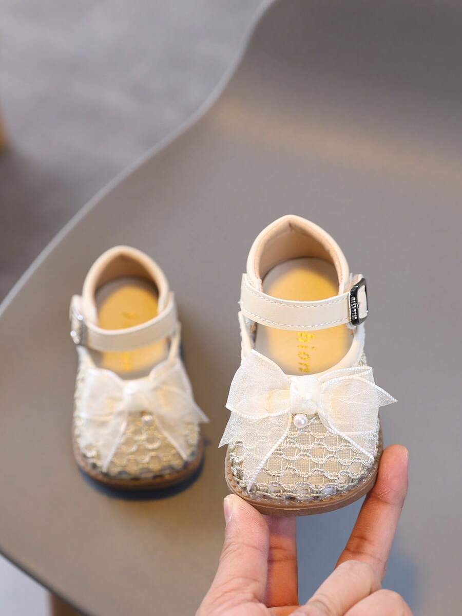 1 đôi giày cho bé gái, giày công chúa lưới nơ dễ thương mới cho bé gái tập đi, đế mềm nhẹ, thích hợp cho bé bò, mùa xuân/hè/thu/đông. - Màu be - Xem 1