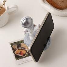1 pièce Support créatif pour téléphone et tablette en forme d'astronaute - Matériau ABS durable, design de dessin animé mignon avec figurine d'astronaute dynamique, convient pour la maison, le bureau, les cours en ligne, la décoration d'astronaute - Multicolore - Voir 7