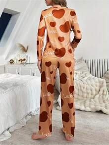 Ensemble de pyjama et de vêtements d'intérieur avec manches longues et pantalon long pour femmes, spécialement conçu pour la Saint-Valentin, avec des imprimés de cœurs et de slogans, convenant à l'automne et à l'hiver, tissu confortable et coupe ample pour une soirée cocooning, décoré d'un beau motif, pantalon long avec taille élastique. - Couleurs mélangées - Voir 10