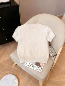 Suéter de manga corta de punto elástico de longitud regular para mujer, jersey casual de cuello redondo con estampado de lazo - Nuevo color albaricoque - Ver 3