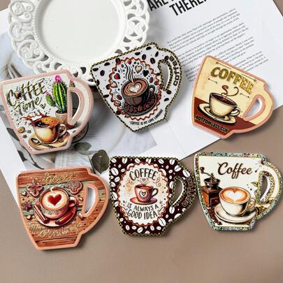 1个创意可爱咖啡杯造型杯垫，高清印刷，烫金工艺，陶瓷材质，耐热，适合家庭使用