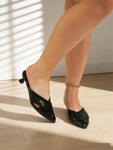 Giày mule mũi nhọn màu đen mới mùa hè 2026 với quai chéo, phù hợp cho phụ nữ có bàn chân rộng, kiểu dáng thanh lịch với gót thấp giúp thon gọn vóc dáng, sandal cao gót tối giản dành cho công sở. - màu đen - Xem 1