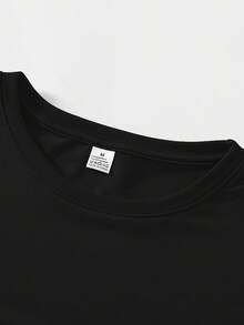 Disney Men'S T-Shirt Featuring A  Print Of Nick From Zootopia With The 'EST.2016' Logo, Designed With A Minimalist And Versatile Style. This Fashionable Round-Neck T-Shirt Is Made From Twill Fabric And Is Perfect For Summer Casual Wear - Black - View 3