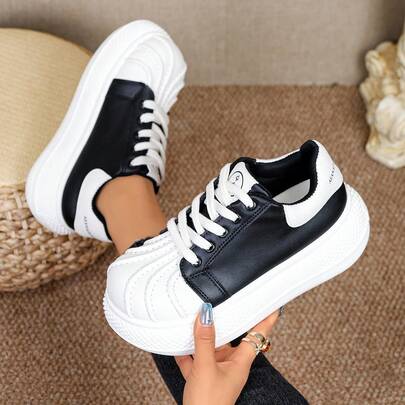 纯色系带金属孔休闲鞋