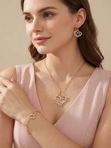 Bộ 4 món gồm bông tai hình trái tim đôi, dây chuyền và vòng tay, trang sức cưới dành cho nữ. - Vàng - Xem 1