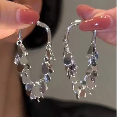 1 par de pendientes elegantes y únicos con flor de lentejuelas metálicas en forma de lágrima y borlas, para mujeres