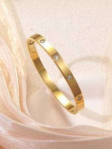 Bộ trang sức hình cỏ bốn lá bằng thép không gỉ được đánh bóng thủ công tinh tế, gồm dây chuyền, vòng tay và bông tai, thích hợp để đeo hàng ngày. - Vàng - Xem 2