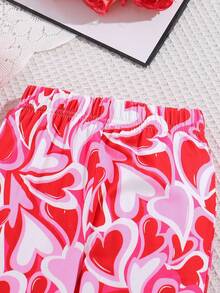 Set de 2 piezas de camiseta de manga corta de cuello redondo y pantalones acampanados con estampado de corazón para niñas pequeñas de moda - Rojo - Ver 5
