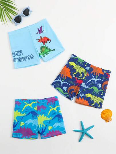 三件套可爱恐龙印花数码男童泳裤，采用弹性腰带设计，弹力速干舒适面料，时尚度假风，适合户外沙滩、冲浪、泳池派对、海滩度假等场合。