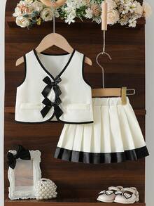 女婴可爱优雅V领无袖3D蝴蝶结假口袋撞色滚边开衫上衣搭配百褶裙，两件套时尚百搭女童套装，适合春夏日常、派对、外出等场合。 - 彩色 - 查看 1