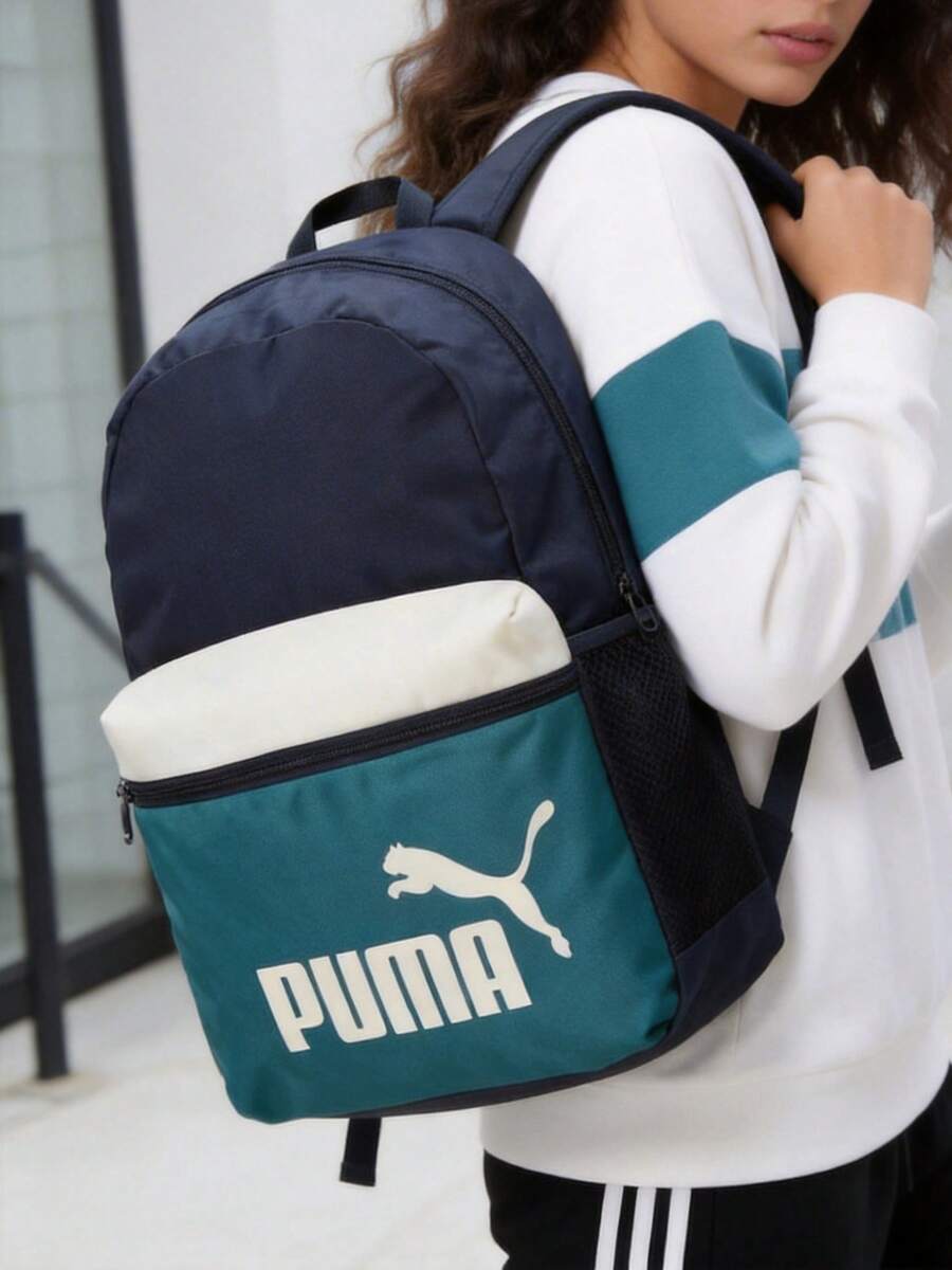 Mochila PUMA PHASE COLOR BLOCK, mochila casual ligera para ir y venir, mochila escolar, unisex 091175-07 - Azul marino-verde esmeralda - Ver 1