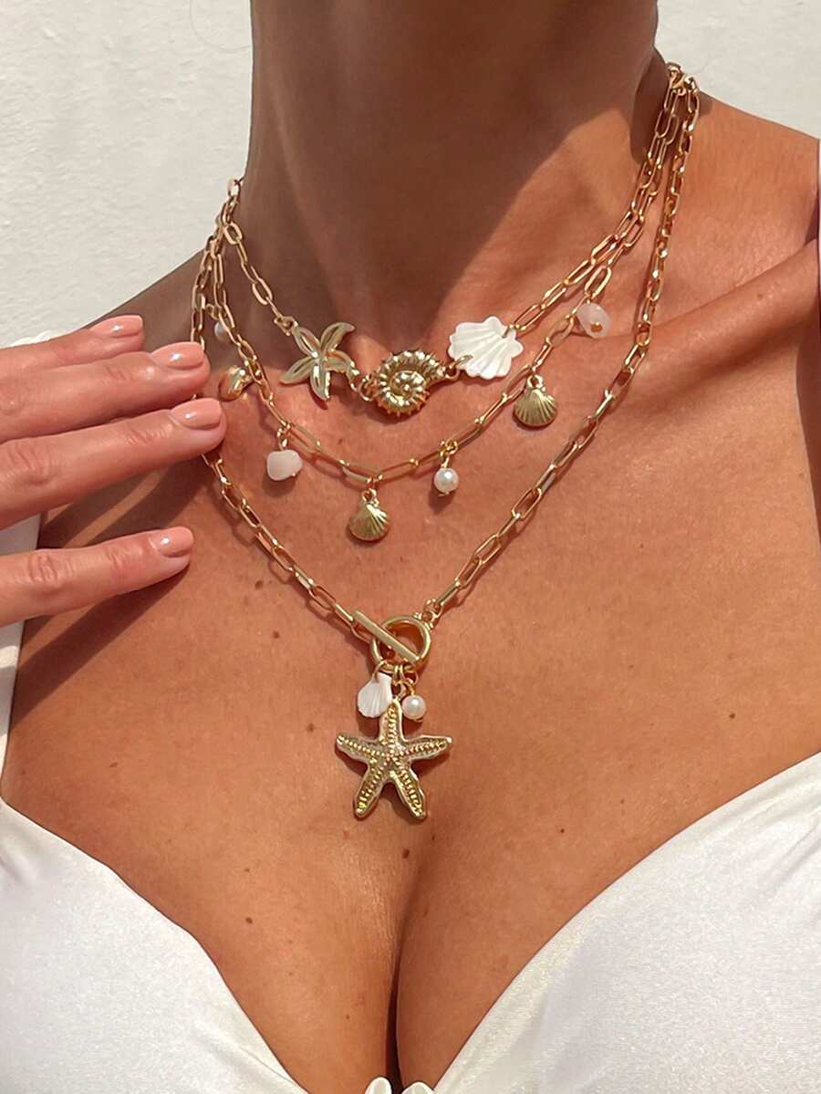 Set de 3 piezas de collar con colgante de estilo de vacaciones oceánicas que incluye concha, caracol y estrella de mar, con cierre de metal OT. Collar con colgante de estrella de mar 3D, collar con colgante de concha de caracol 3D creativo y de moda, adecuado para uso diario, vacaciones y fiestas de mujeres. - Dorado - Ver 1