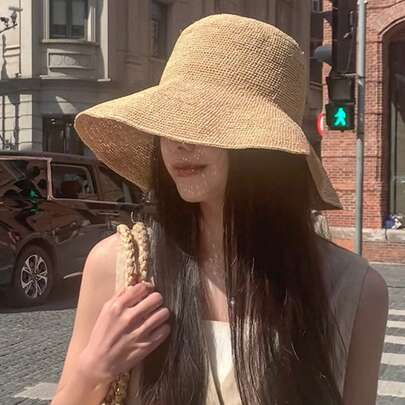 Este sombrero de paja de ala ancha tejido a mano y transpirable es muy adecuado para actividades al aire libre como vacaciones en la playa, pesca, senderismo, viajes y trabajo en la granja. Es un instrumento ideal de protección solar.