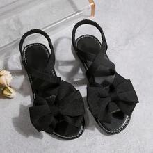 Dép xăng đan đế bằng dáng suông, thoải mái, tối giản, mũi tròn, dây thun chéo, trang trí nơ cho nữ cỡ lớn, dép hở mũi thời trang thường ngày cho bãi biển và mùa hè. - màu đen - Xem 7