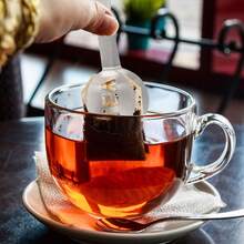 Prensa para bolsitas de té plateada, pinza ovalada de acero inoxidable para bolsitas de té, pinza y soporte para colador de té, adecuada para sujetar cubitos de hielo, azúcar, coladores y filtros de té, accesorios para té. - Plateado - Ver 5