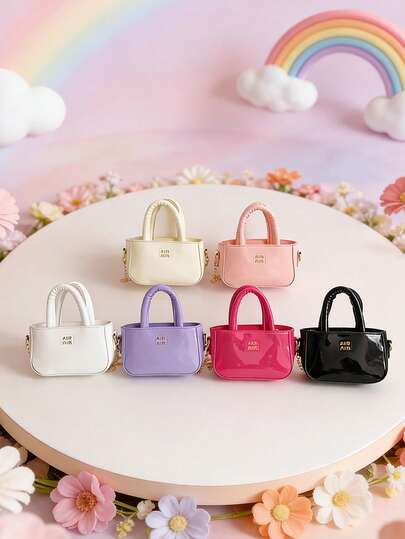 这款时尚纯色迷你手提包采用PU拉链封口，适合各种场合，用途广泛，可用于户外、玩耍、通勤等任何场合。它是送给青少年的完美礼物。