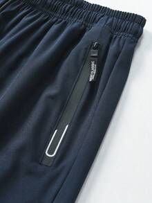 Novos Lançamentos para Todas as Estações, e Shorts Esportivos Casuais Unissex Frescos para Homens e Mulheres. Com Cordão na Cintura e Bolsos Laterais Duplos com Zíper. Esportes - Azul Marinho - Visão 4