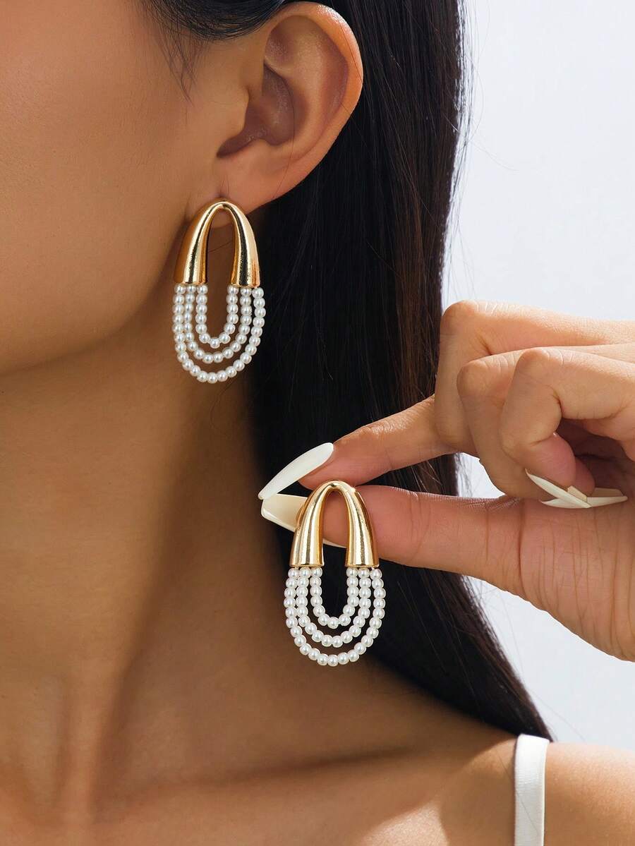 1 Đôi bông tai dáng dài đính nhiều lớp ngọc trai giả, kiểu dáng thanh lịch, phù hợp cho nữ giới đeo hàng ngày, hẹn hò, đi làm và dự tiệc. - Nhiều màu - Xem 1