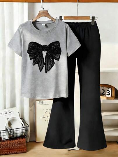 Bộ 2 món gồm áo thun ngắn tay in hình bướm và quần ống loe dành cho nữ tuổi teen, kiểu dáng thể thao rộng rãi thoải mái - Món quà mùa hè hoàn hảo, thích hợp mặc đi học và dã ngoại vào mùa xuân và mùa hè.