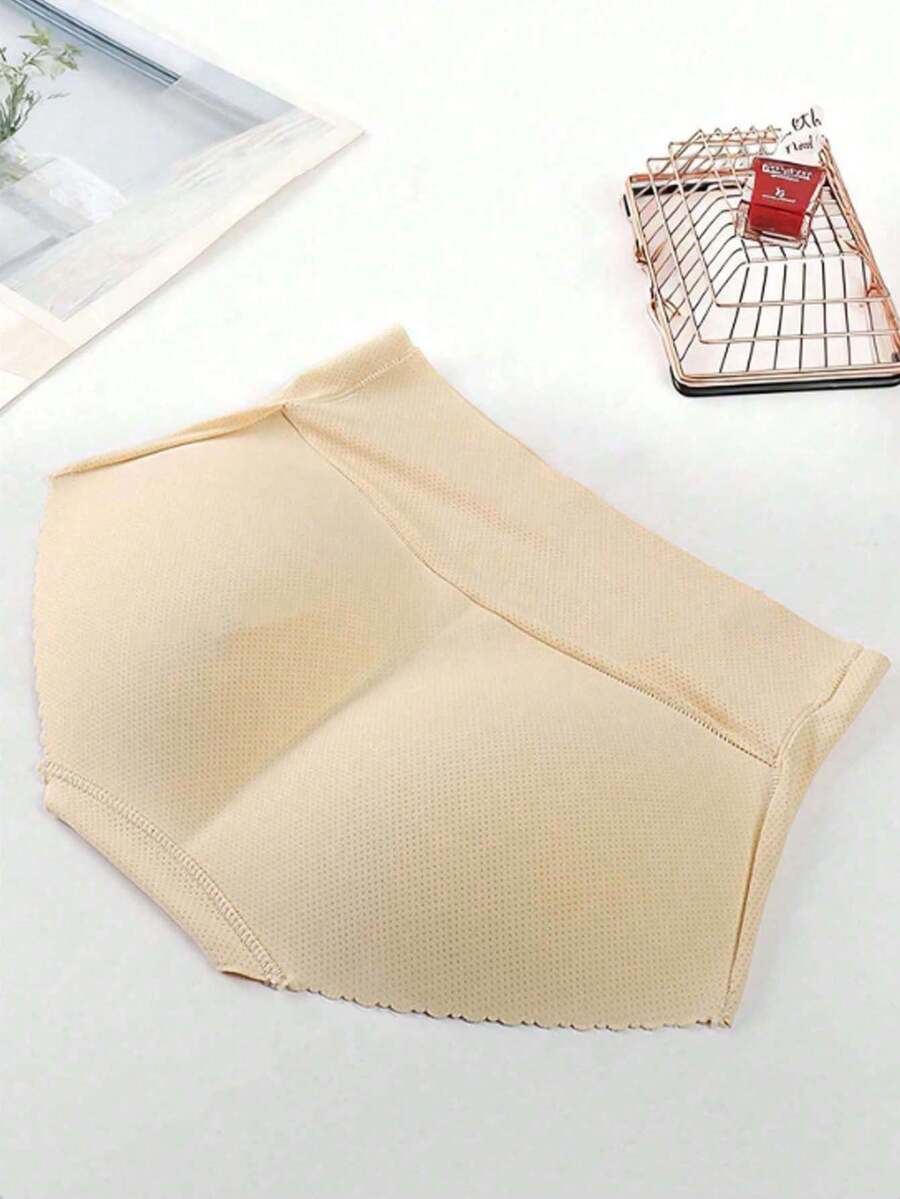 1 chiếc quần lót nâng mông cạp cao dành cho nữ, thiết kế thoáng khí, cạp thấp với chức năng kiểm soát vùng bụng và tạo hình mông giả giúp tôn lên đường cong vòng ba. Đây là loại quần lót định hình nâng mông có đệm, giúp tạo dáng mông hình trái tim. Không có lớp đệm bên trong, thoải mái và thân thiện với da, thích hợp làm đồ lót. Quà Giáng sinh, quà tặng gia đình năm mới, quà tặng lãng mạn ngày Valentine. - Nhiều màu - Xem 1