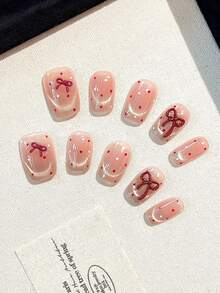 Conjunto de 10 unhas postiças quadradas feitas à mão com laço tridimensional, olho de gato vermelho com bolinhas e francesinha. Ideal para mulheres e meninas usarem no dia a dia, em festas e encontros. Acompanha cola em gel e tiras de polimento como brinde para quem gosta de unhas postiças. - Multicolorido - Ver 4