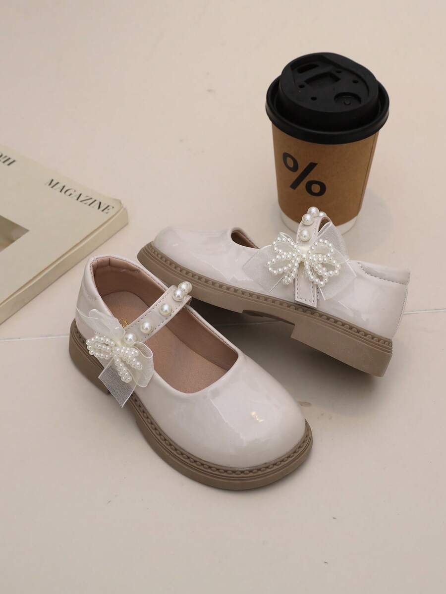 1 par de zapatos de princesa para niños con lazo de perlas, parte superior de cuero para primavera/otoño, suela blanda, zapatos de moda para niñas pequeñas, adecuados para la escuela, actividades al aire libre y diarias - Beis - Ver 1