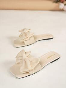 Sandalias planas para mujer, versátiles, con lazo negro casual y punta abierta, nuevas sandalias de plástico de ocio y playa para el verano 2025 - Beis - Ver 5