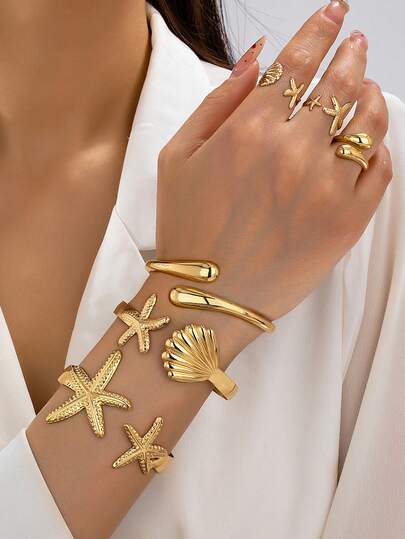 6-delige minimalistische goudkleurige armbanden- en ringenset met strandvakantiethema, in de vorm van een zeester, schelp of waterdruppel, geschikt voor vrouwen, gemaakt van massief metaal en zinklegering.