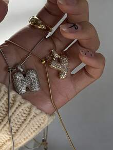 1 chiếc vòng cổ mặt dây chuyền chữ cái đơn giản, đính đá Cubic Zirconia 3D sang trọng, khắc tên theo yêu cầu, mặt dây chuyền chữ cái đầu MAMA cá nhân hóa, món quà thời trang dành cho mẹ, bạn gái, vợ, con gái, nhân dịp kỷ niệm, Ngày Valentine, Ngày của Mẹ, sinh nhật, tốt nghiệp, trang phục thường ngày, đám cưới, tiệc tùng. - Vàng - Xem 7