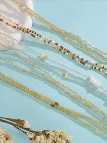 8件套波西米亚风串珠腰链套装，长度31.5英寸，配有邪眼、蝴蝶和贝壳吊坠，适合女性海滩度假和日常佩戴。 - 款式B - 查看 6