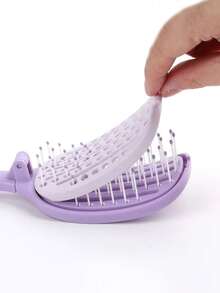 1支折叠式自清洁发梳。一梳即可轻松去除碎发，顺滑不拉扯。方便携带，干湿两用。适用于直发和卷发。 - 彩色 - 查看 4