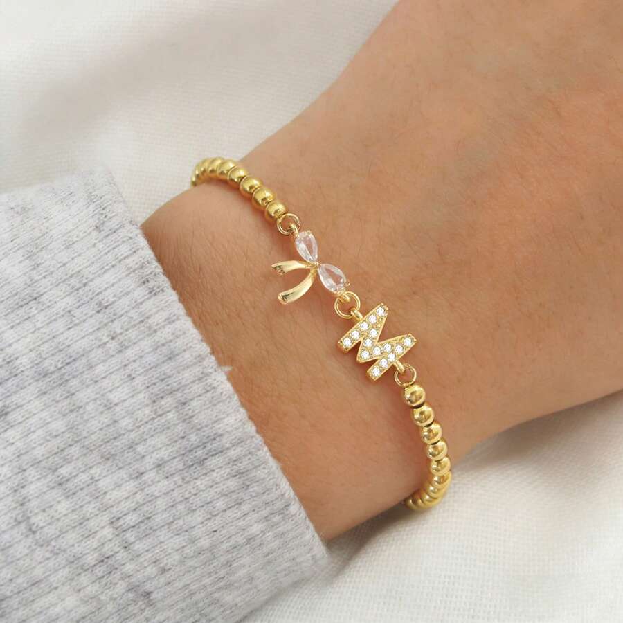 1 chiếc vòng tay mặt dây chuyền nơ chữ cái đầu kiểu cổ điển mới, hạt vàng, dây chuyền điều chỉnh được dành cho nữ. - Vàng - Xem 1