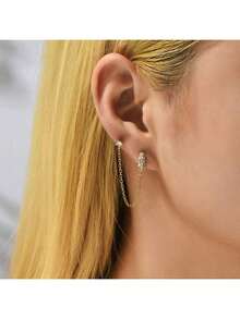 一只耳环由一条流苏链连接一个镶嵌闪亮玻璃水钻的耳钉组成，适合嘻哈、日常佩戴、音乐节和朋克风格。 - 金色 - 查看 2