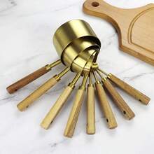 This 8-Piece Set Of Gold Stainless Steel Measuring Spoons And A Baking Measuring Cup With A Solid Wood Handle Is A Precise Measuring Tool For The Kitchen. It Is Suitable For Accurately Weighing Ingredients Such As Coffee Powder, Tea Leaves, And Sugar, Ensuring Consistent Beverage Flavor. It Is Perfect For Baristas And Tea Lovers. - màu nâu - Xem 7